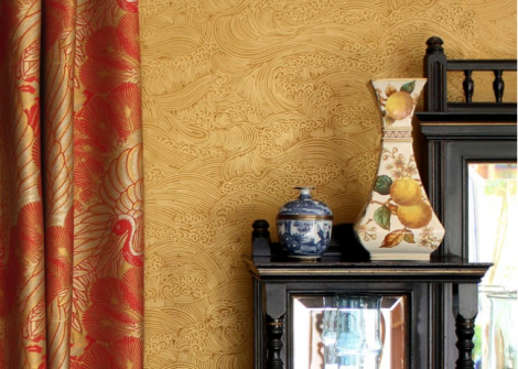 Anglo-Japanese designs, popular during the 1880’s, are particularly suitable for the Queen Anne interior. Here, the ‘Japonesque Wave’ wallpaper, printed in gold on ochre, coupled with ‘Flying Cranes’ fabric, make an exotic pairing. Both available from: www.CharlesRupertDesigns.com. The Aesthetic English vase, blue and white china jar and English sideboard c1880 are original.